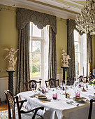 Festively set table in historic dining room