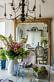 Dining room with Gustavian dining table and Georgian-style mirror