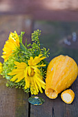 Marigolds and fennel blossoms, with a hollowed out pumpkin as a vase