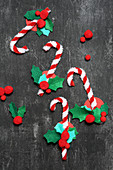 Candy cane decorations handmade from pipe cleaners and pompoms