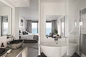 Luxury ensuite bathroom with view to sea