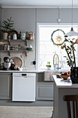 Kitchen in shades of grey decorated for Christmas