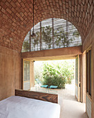 Simple bedroom with vaulted ceiling in Casa Volta