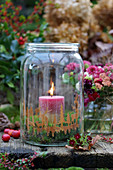 Mason jar as a lantern with a forest motif