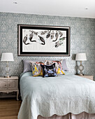 Oriental picture in classic bedroom in blue-grey colour scheme
