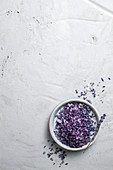 Colourful bath salts with lavender flowers