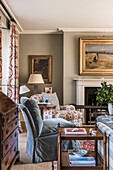 Contrasting fabrics and antique furniture in Georgian family home