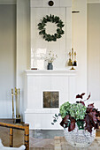 White tiled stove with leaf wreath