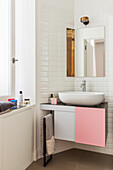 Bathroom Vanity with countertop sink in bathroom with white subway tiles