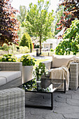 Rattan furniture with black table on terrace