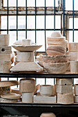 Shelf with various ceramic pots
