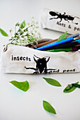Pencil case with insect motif