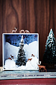 Mini winter scene, arranged in a wooden shadow box