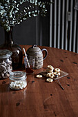 Christmas biscuits and candy on round wooden table
