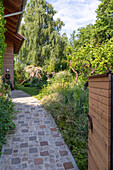Paved path in a sunny garden