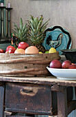 Fruit bowl on rustic kitchen table