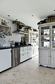 Large kitchen in Shabby Chic with glass cabinet as room divider