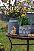 Rustic Easter arrangement with ranunculus and Easter bouquet of willow catkins