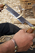 Carpentry working with with traditional woodworking tools