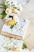 Millefeuille of nougat, decorated with rose petals