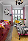 Colorful living room with sunflowers and yellow carpet