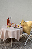 Set table and chair, table linen and cushion cover dyed with natural dyes