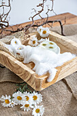 Wooden tray with foam, soap and flowers