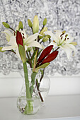 Bunch of lilies in glass vase