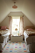 Twin bedroom of Norfolk beach house, UK