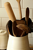 Wooden kitchen utensils in Brighton home, East Sussex, England, UK