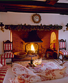Country style cottage sitting room decorated for Christmas