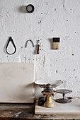 Weight scales and tools on workbench Brighton studio of ceramic artist East Sussex, UK