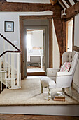 French antique chair with hand-printed cushion on landing in Grade II listed farmhouse Kent, UK