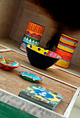 Painted wood coffee table made of 4 individual tables with ornaments giving a touch of colour