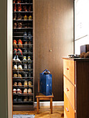 Wenge wood dressing room with storage column for footwear