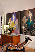 Reclining chair and sideboard with modern art portraits