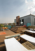 Rooftop terrace with sunloungers