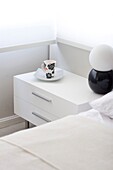 Teacup on night table in modern bedroom, Palermo, Buenos Aires, Argentina