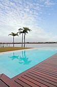 Swimming pool with view on lake, Pacheco, Buenos Aires, Argentinien