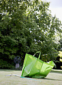 Garden bag for weeding on back garden lawn
