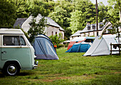 Pitched tents and campervan