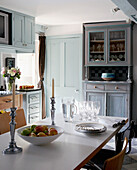 Contemporary kitchen with verdigris finish in Grade I listed Elizabethan manor house in Kent 