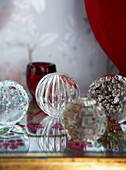 Four glass paperweights