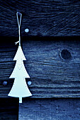 Christmas tree decoration on wooden exterior