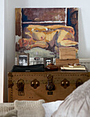 Artwork and ornaments on travelling chest in Grade II listed Georgian townhouse in London