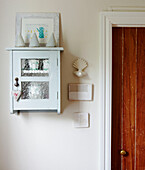 Wall mounted painted cabinet in Wairarapa home North Island New Zealand