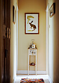 Artwork above small side table in Surrey hallway