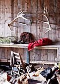 Antlers above work bench of outhouse