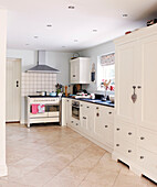 Cream country kitchen with white fitted units
