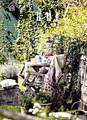 Garden breakfast table and candelabra City of Bath Somerset, England, UK